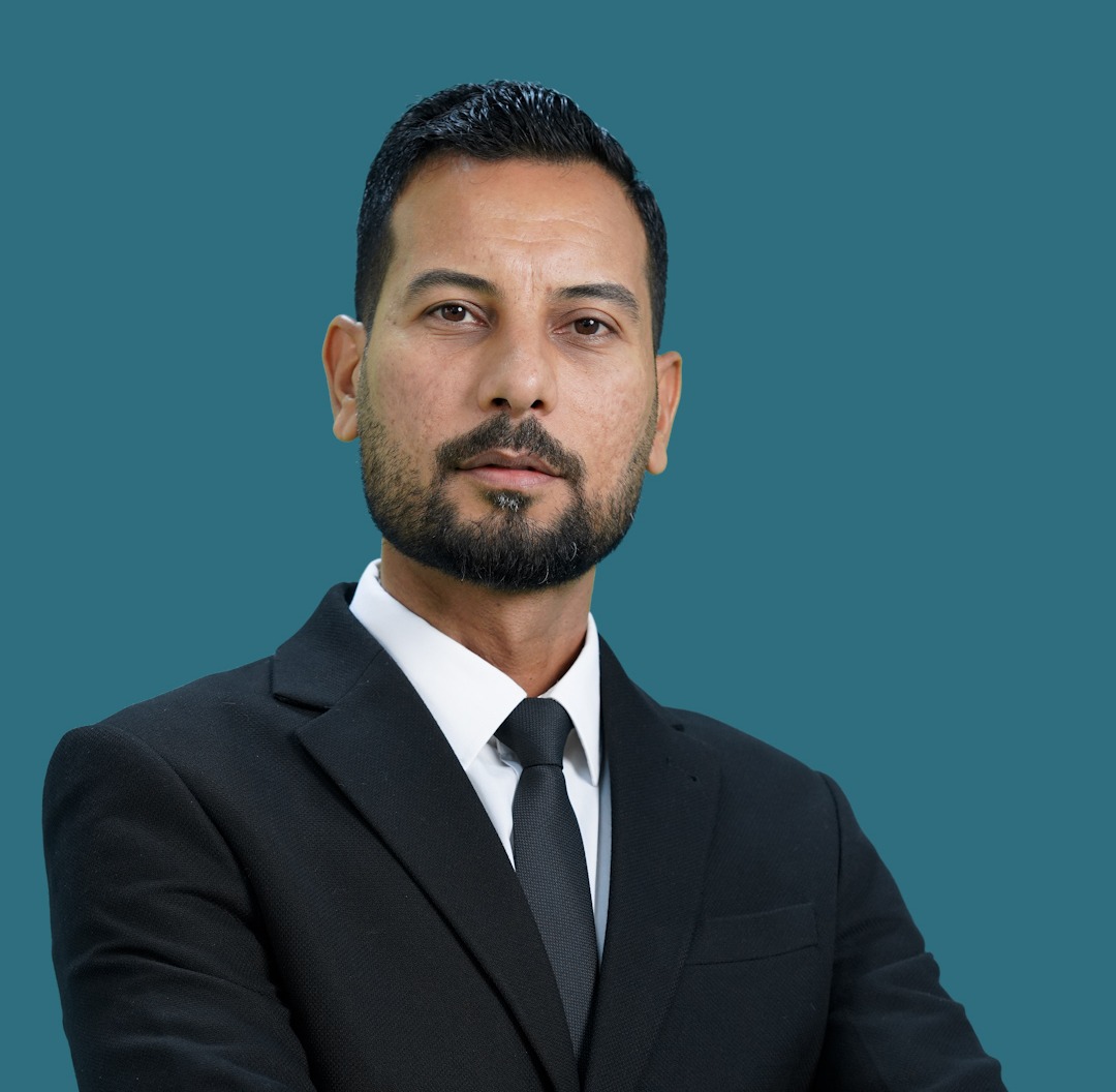 م.د.أكرم محمد عبدالكريم/عضوا