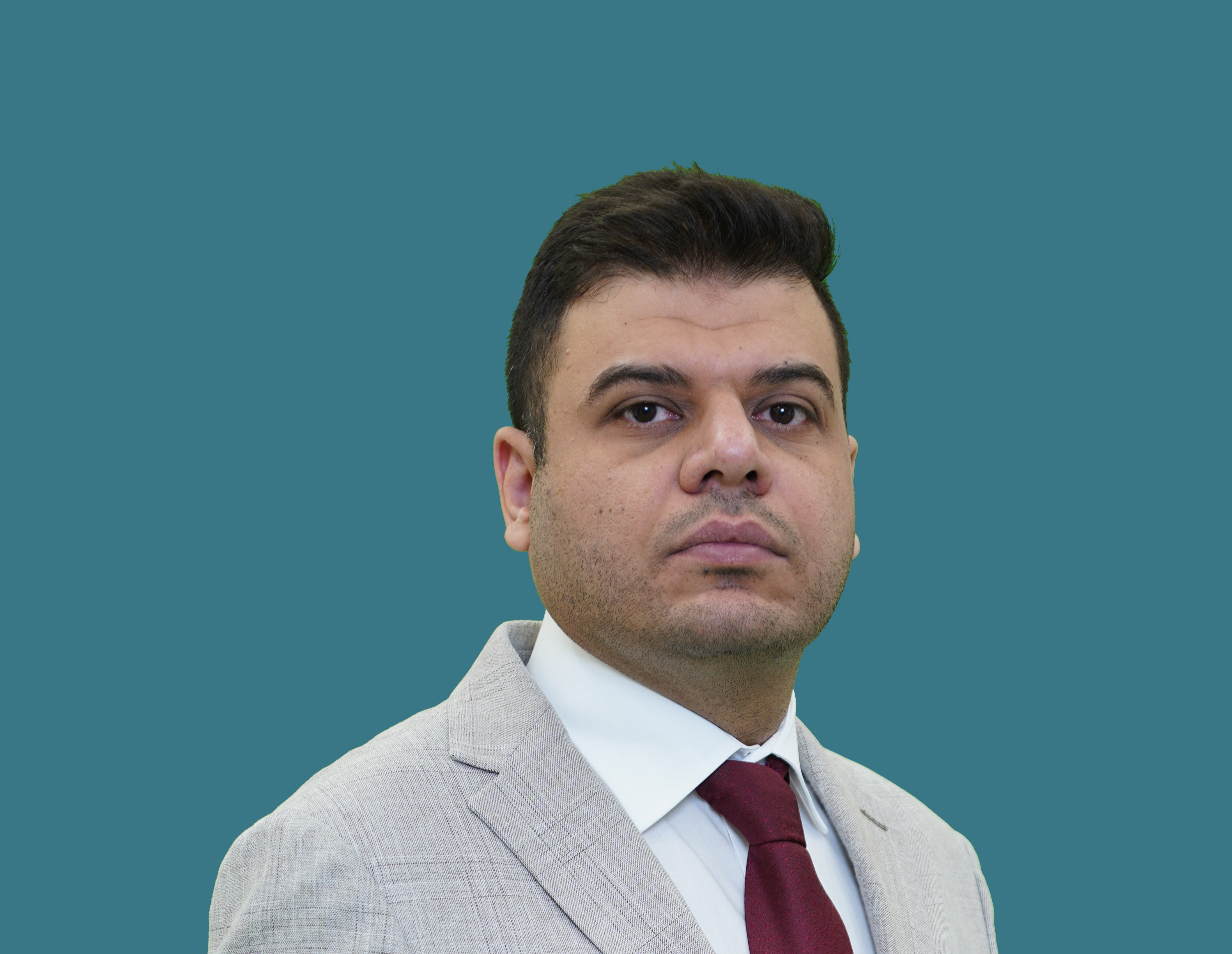 م.د.احمد عبدالرزاق قاسم/عضوا